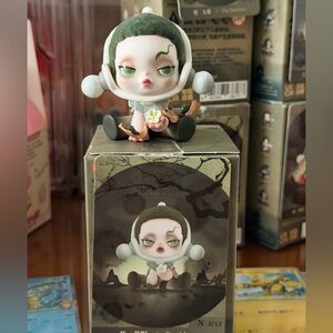 Skull panda figurine